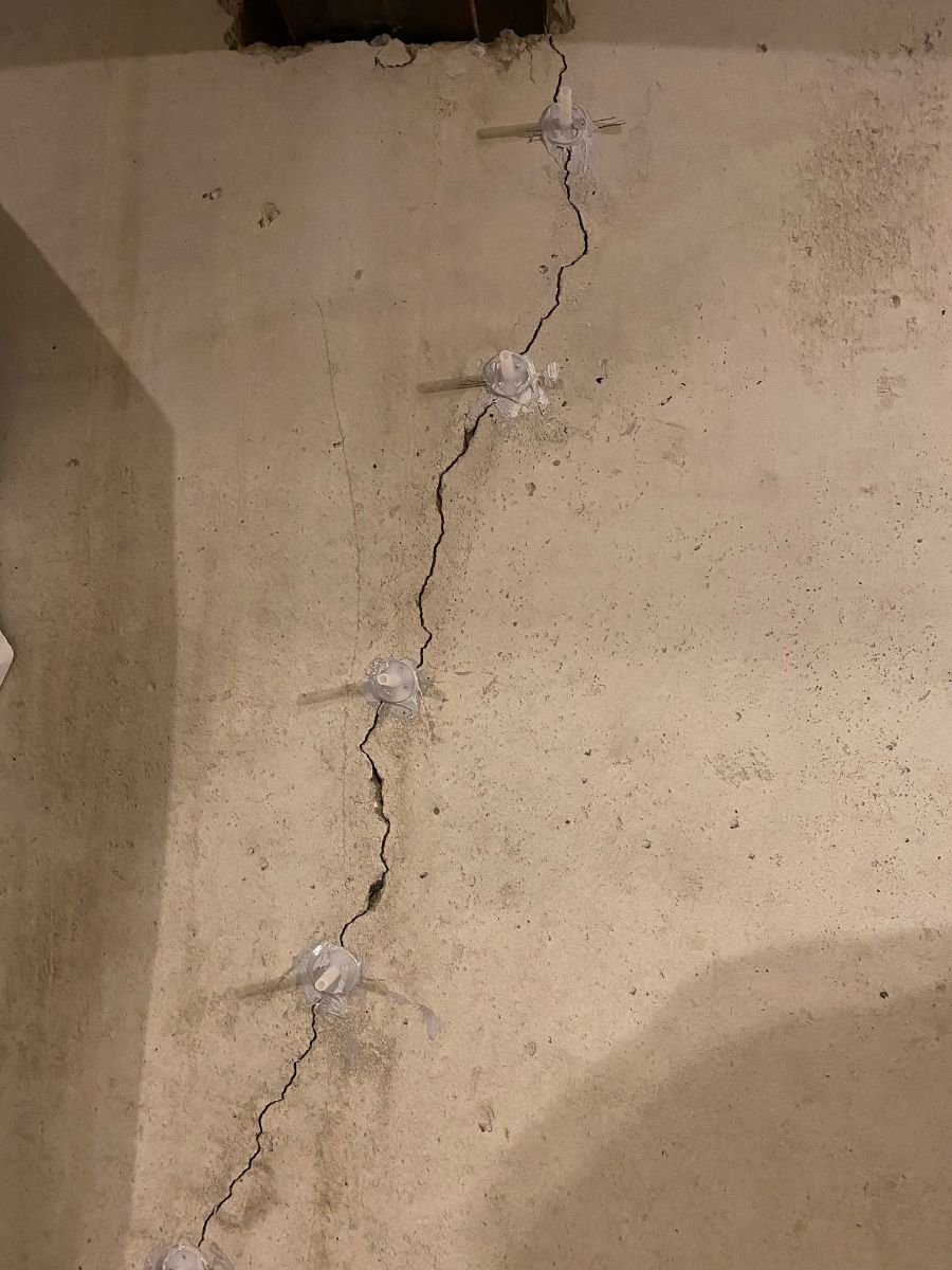 basement wall crack in the process of being fixed