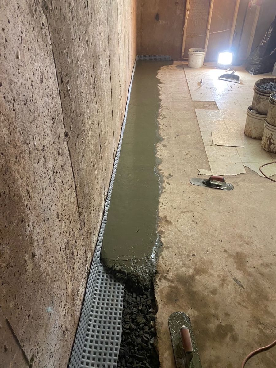basement floor drain being sealed